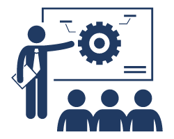 Image of a presentation in the promotional items industry, with one person pointing at a screen displaying a gear, in front of three seated individuals.