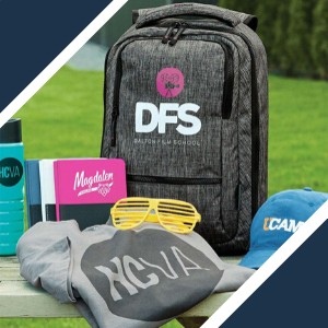 A backpack with "Dalton Film School" on it, a water bottle, a spiral notebook, a gray sweatshirt, yellow sunglasses, and a blue cap are displayed on a wooden surface outdoors.